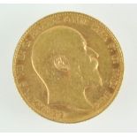 A Edward VII gold full sovereign dated 1909.