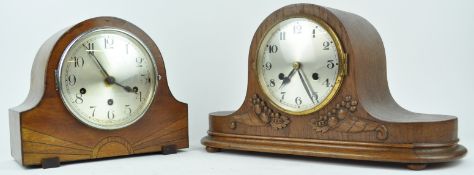 An oak cased mantel clock, with silver dial, 46cm wide,