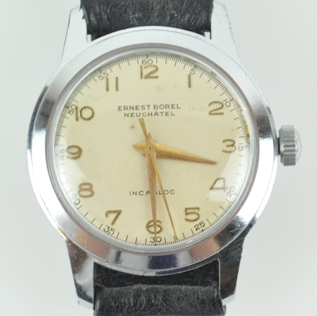 A stainless steel wristwatch. Circular champagne dial signed 'Ernest Borel Neuchatel' Incabloc.