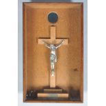 A Crucifix, in oak glazed case, the inscription 'Soignies 19th May 1917,