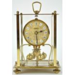 A Kein Anniversary clock, of traditional form, with rectangular four glass case,
