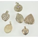 A collection of six white metal lockets, three of heart design, some marked 925,