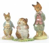 A Beswick pottery Beatrix Potter figure, Foxy Whiskered Gentleman, 12cm high,