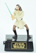 A Star Wars animated interactive figure money box of Qui-Gon Jinn,