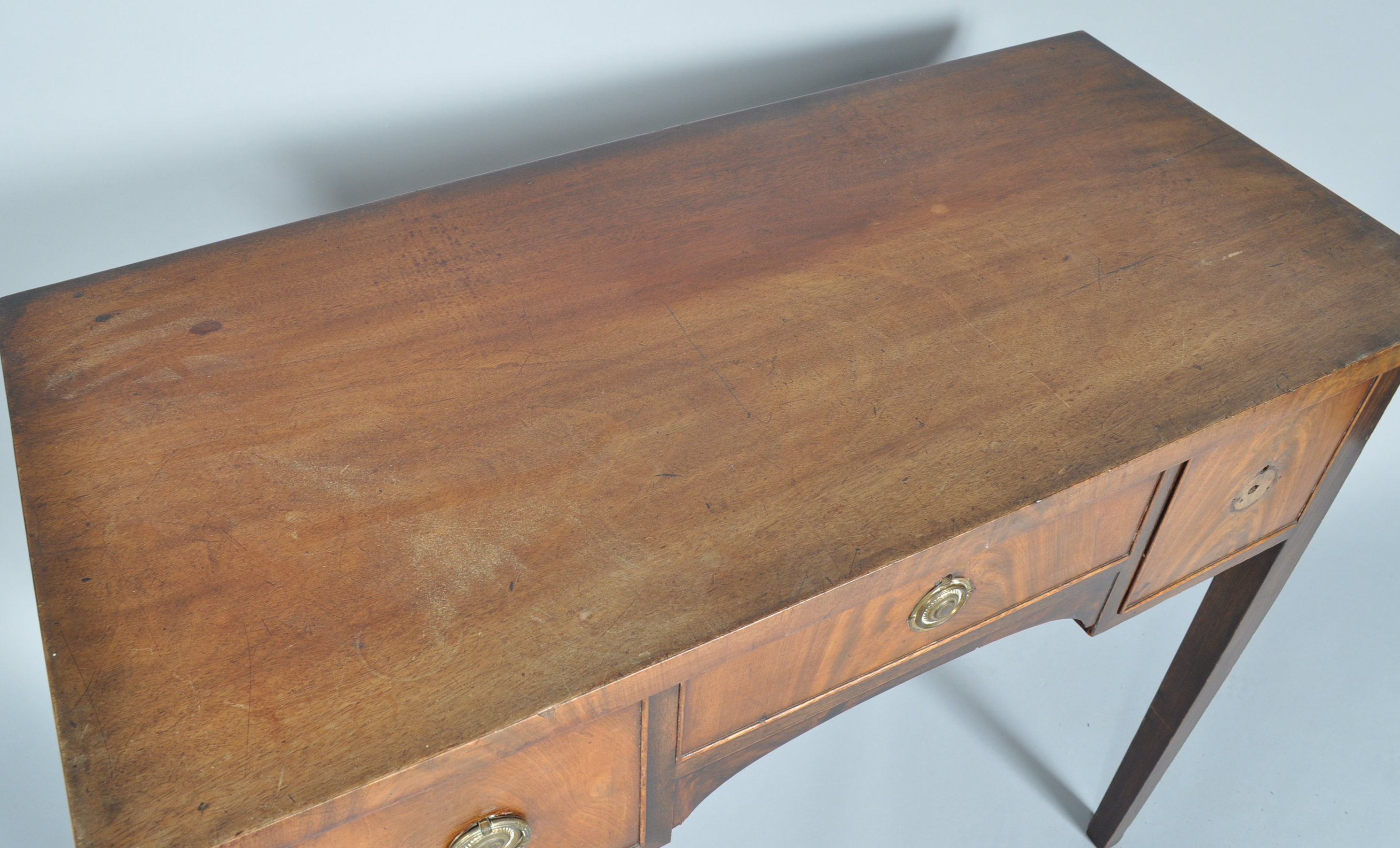 A 19th century mahogany sideboard with three frieze drawers on square tapering legs, - Image 3 of 3