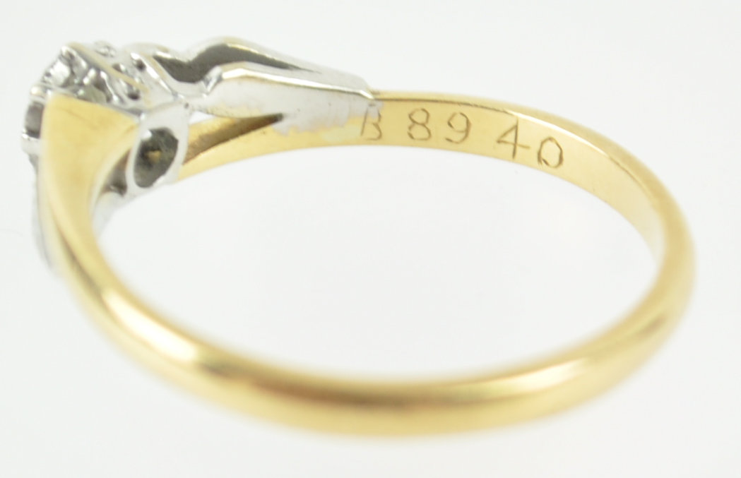 A yellow and white metal single stone ring. - Image 9 of 9