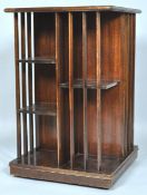 An early to mid 20th Century mahogany revolving bookcase. Measures; 73cm x 47cm x 47cm.