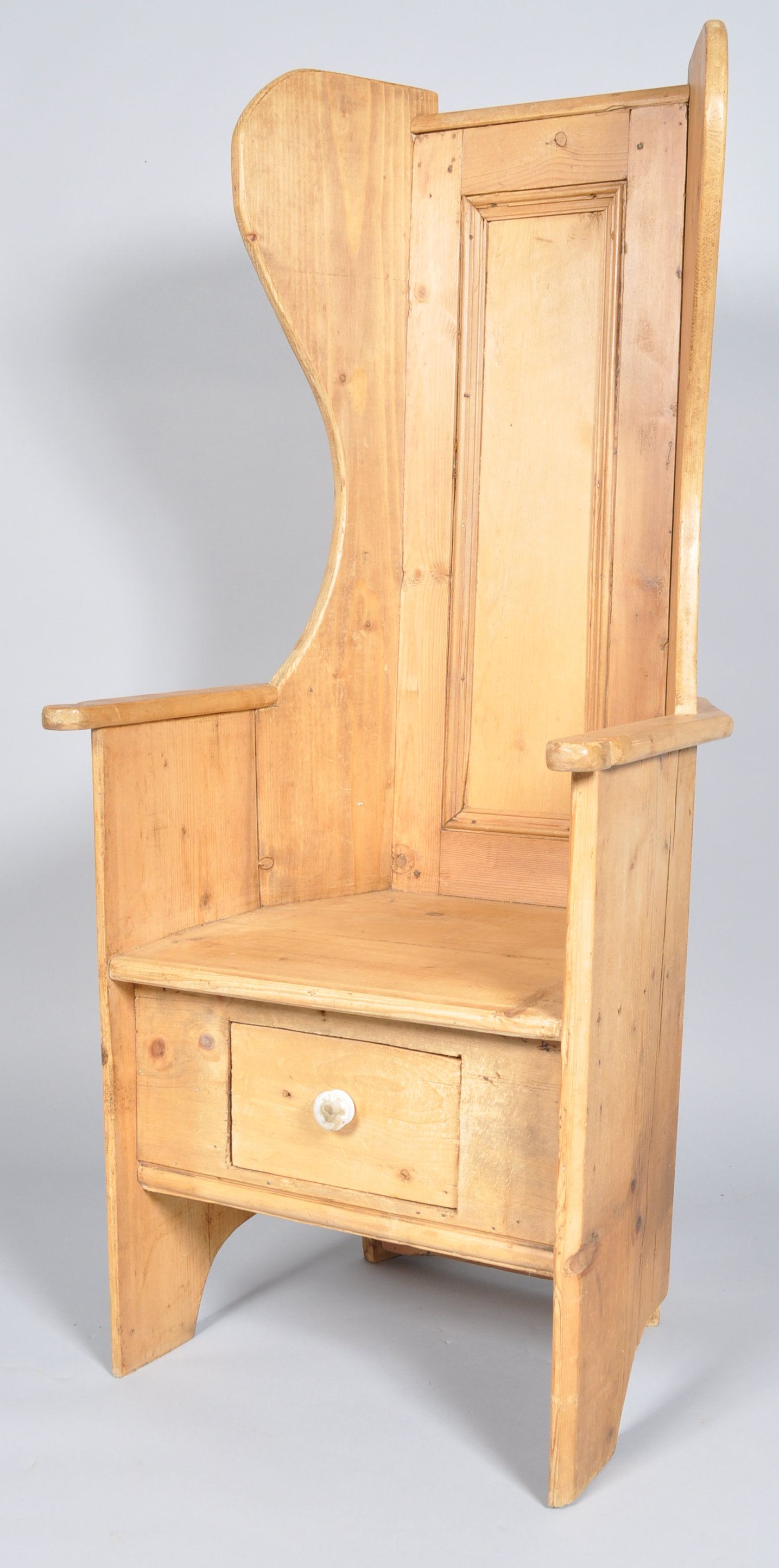 A pine lambing chair in the 19th century style, with panelled back,