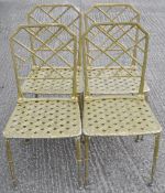 A set of four gold painted aluminium garden chairs with faux bamboo backs and legs,