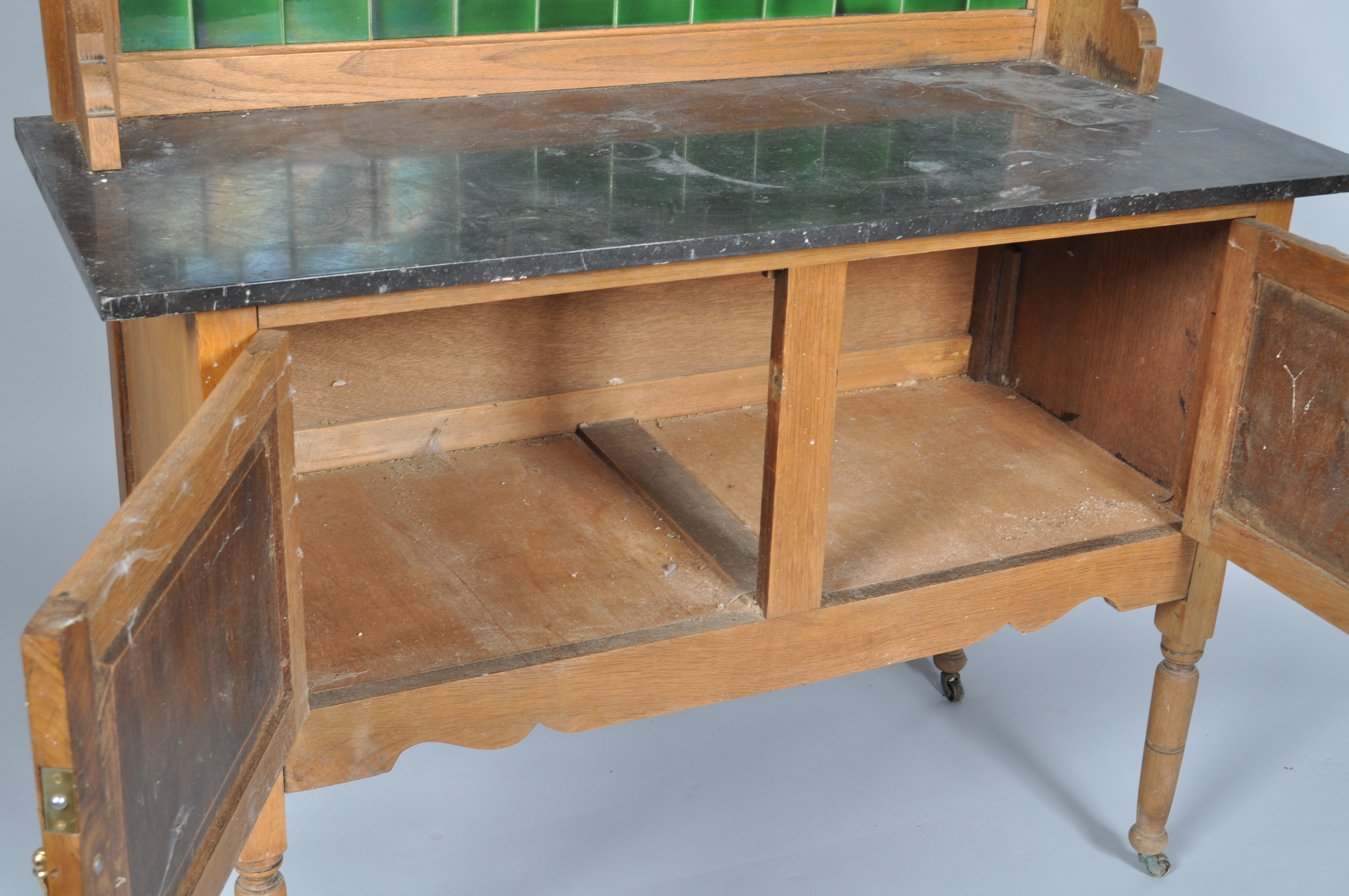 A 19th century oak washstand, with tiled back and marble top above two panelled doors, - Image 3 of 3