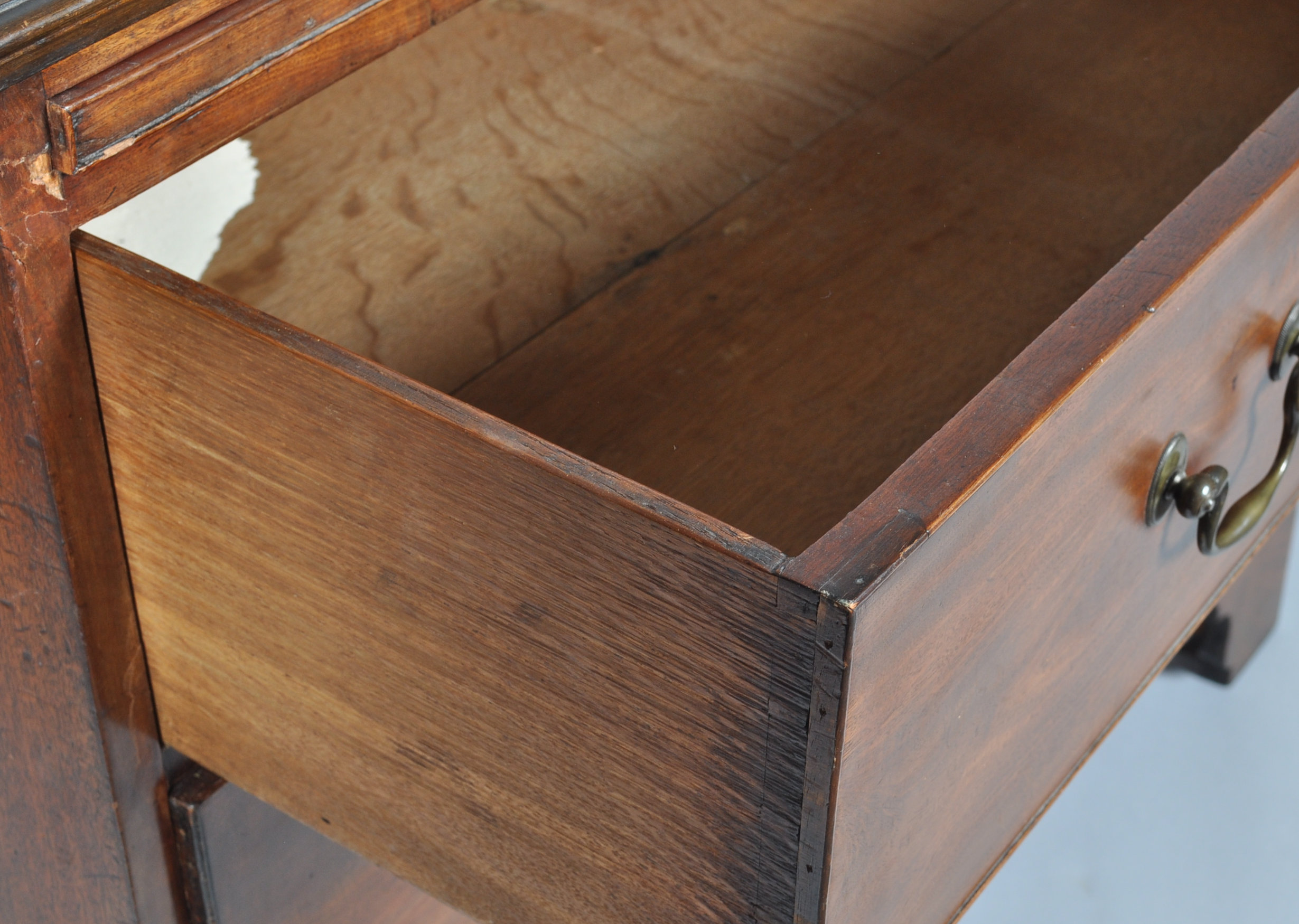 A 19th century mahogany chest of drawers with a brushing slide above three long drawers, - Image 3 of 4