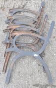 Two pairs of cast iron bench ends, of plain form, overall 78cm,