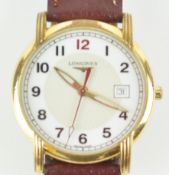 A gold plated Longines quartz wristwatch. Circular dial with numerical markings and date feature.