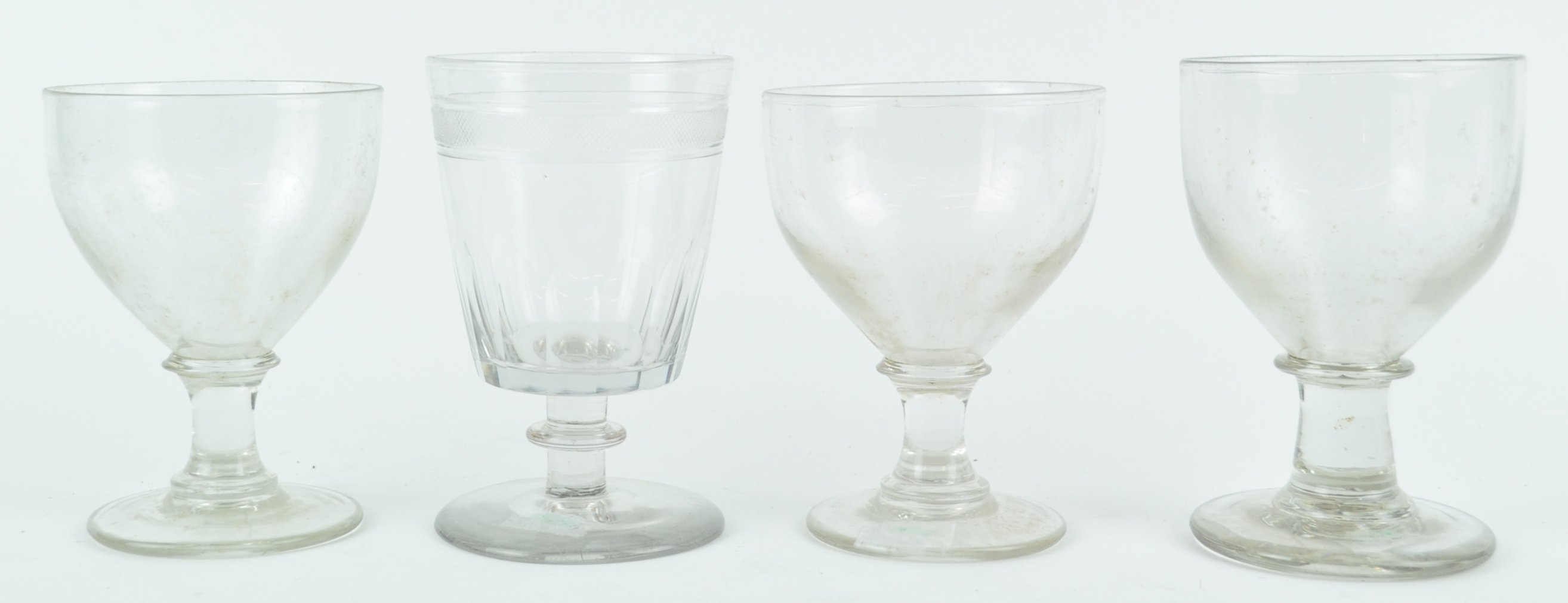 A pair of 19th century glass rummers together with another larger, and another cut glass rummer