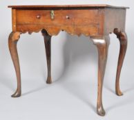 A late 18th century George III mahogany low boy having a flared top above a single drawer