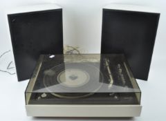 A Bang & Olufsen Beogram 1500 record player and two 1001 Beovox speakers