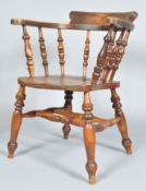 An early 20th century antique vintage fruit wood smokers bow chair