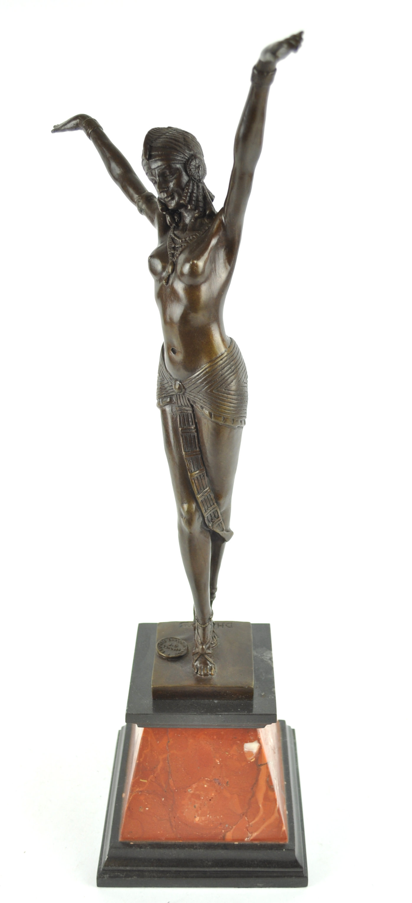 A 20th century bronze of a dancing lady on marble base, after Chiparus,