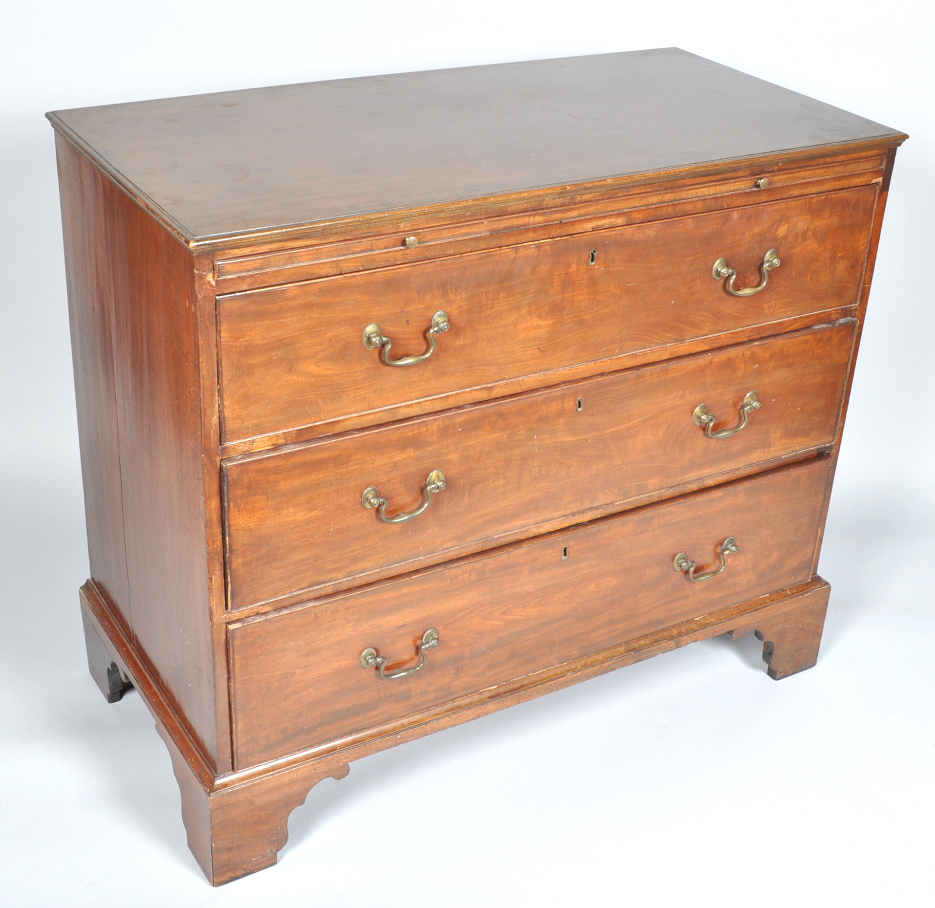A 19th century mahogany chest of drawers with a brushing slide above three long drawers, - Image 2 of 4