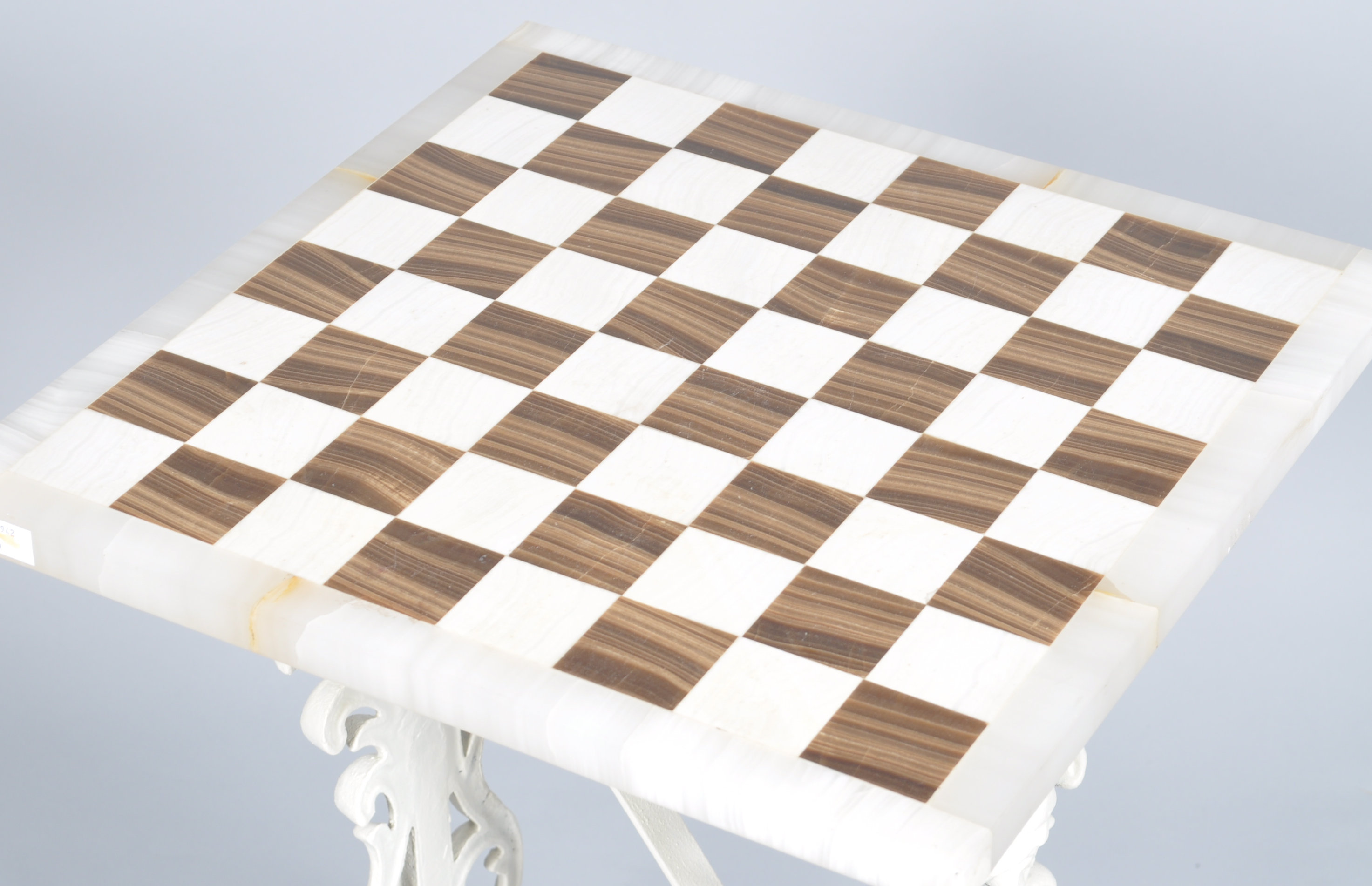 An onyx and hardstone chess table on cast iron white painted legs, - Image 2 of 3