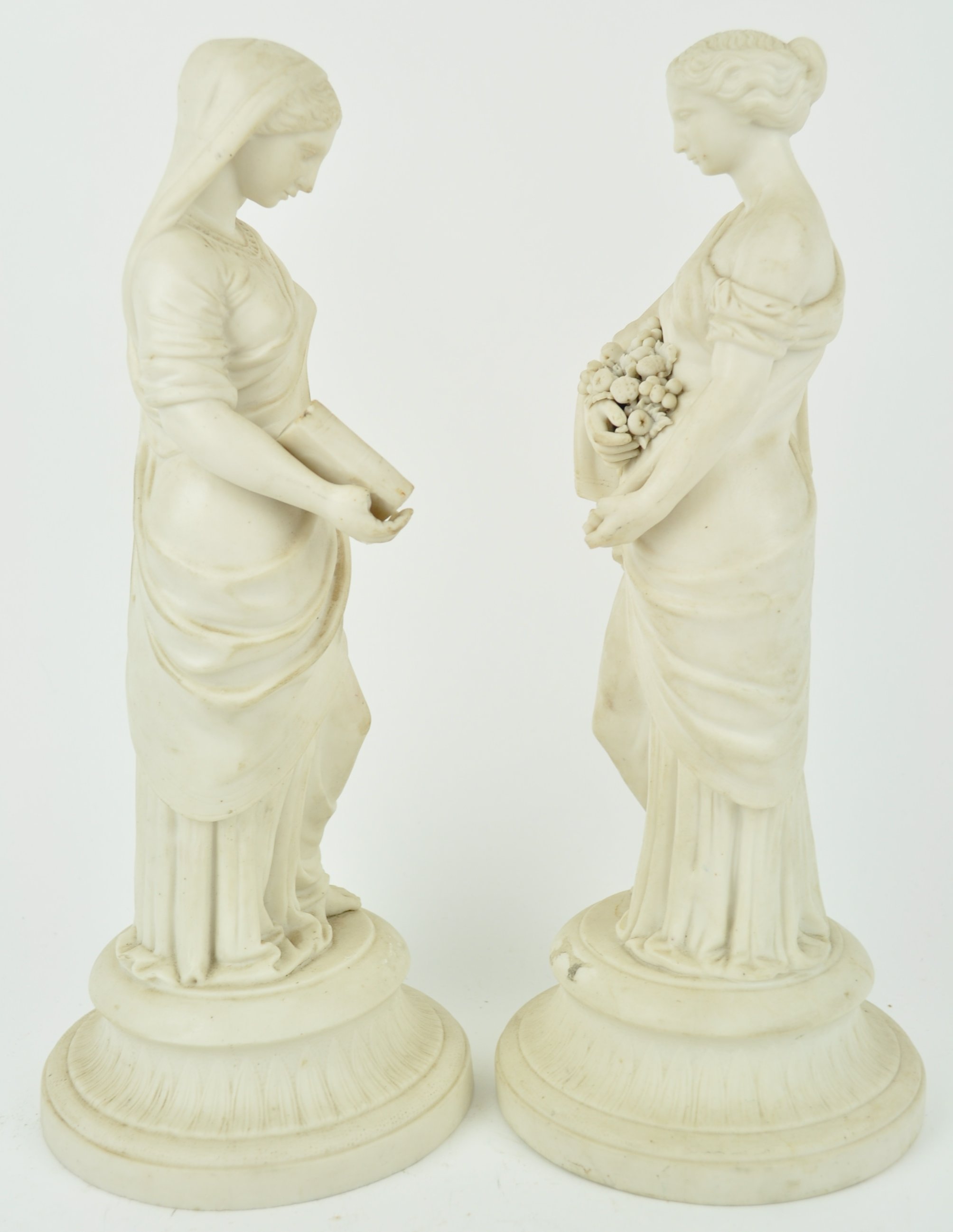 A pair of Parian figures of maidens in draped dresses, one holding a book, - Image 2 of 3