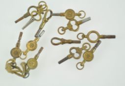 A collection of twelve assorted pocket watch keys,