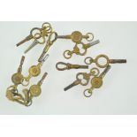 A collection of twelve assorted pocket watch keys,