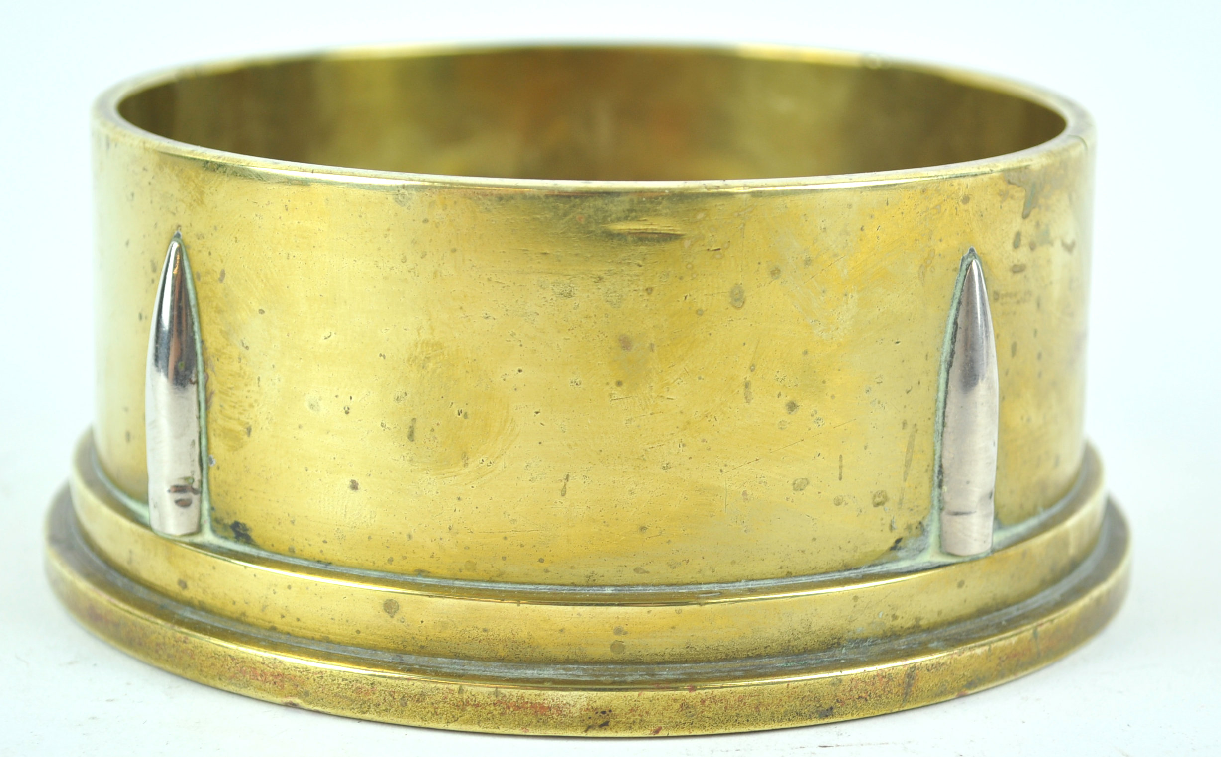 A 1942 trench art ashtray, constructed from the base of a shell case with bullet head decoration, - Image 2 of 3