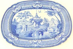 A 19th century blue pearlware meat plate, printed in blue with a chinoiserie scene,
