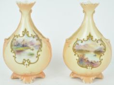 Two Locke & Co Worcester blush ivory chimney vases, with cut out sections,