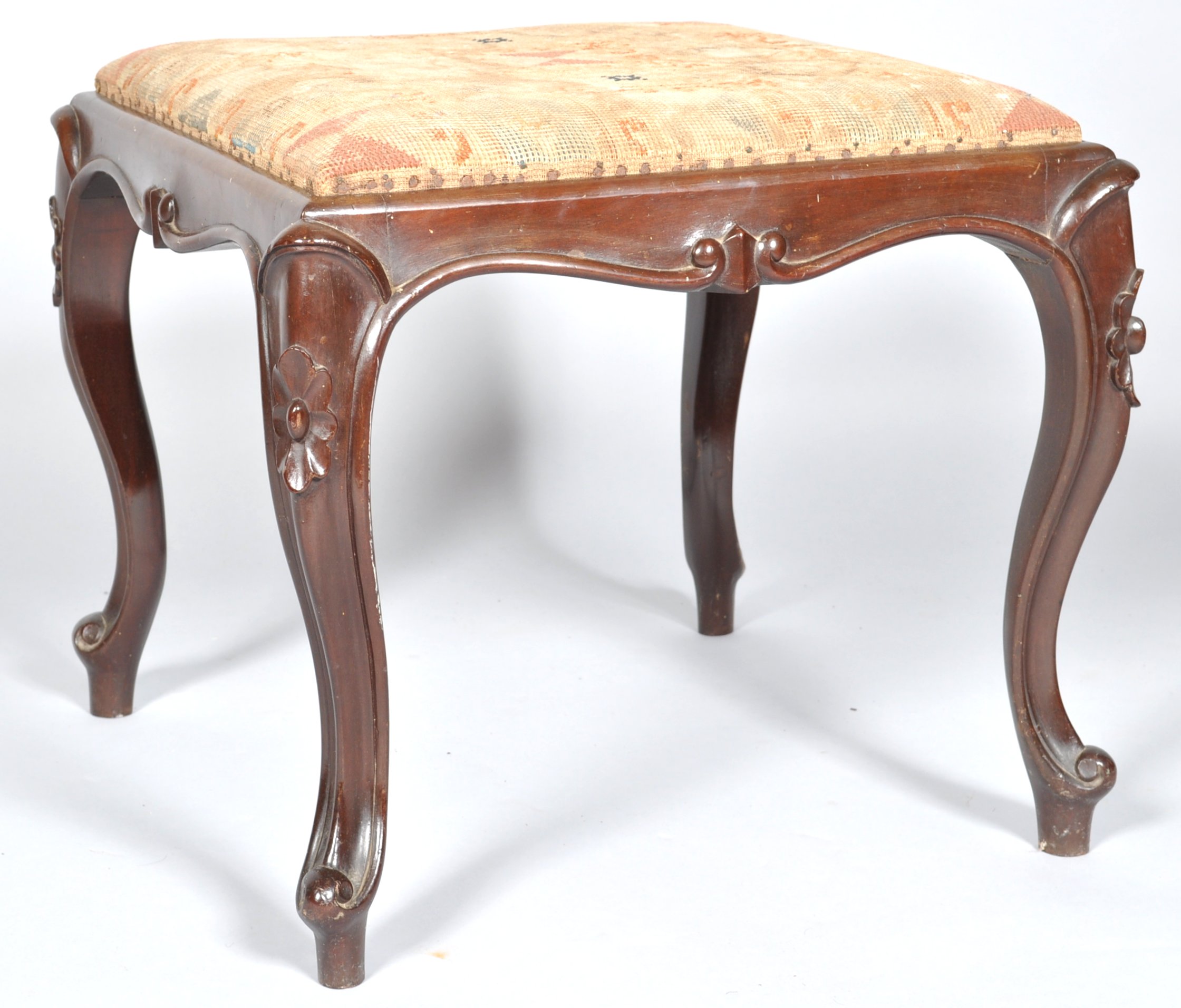 A late 20th Century Victorian antique mahogany square stool having a tapestry upholstered pad seat