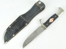 A post WWII Second World War German M7/13 pattern dagger having a chequered grip with scouts emblem,