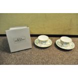 Two Royal Worcester cups and saucers