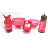 Six pieces of cranberry glass