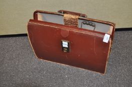 A brief case, coins,