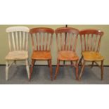 A set of four stick back chairs