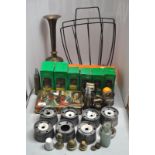 A group of pewter ink wells and other items