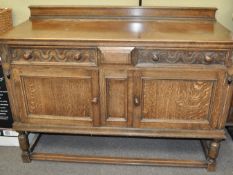 A carved oak sideboard