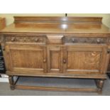 A carved oak sideboard