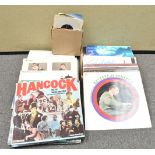 A box of assorted vinyl LP's