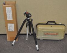 A Canon video camera and a tripod