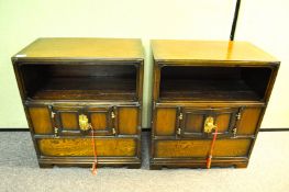 A pair of bedside cabinets