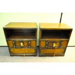 A pair of bedside cabinets