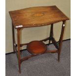 An Edwardian mahogany occasional table