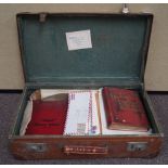 A suitcase containing stamps