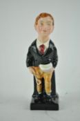 A Doulton Oliver twist figure,