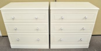 A pair of chest of drawers