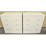 A pair of chest of drawers