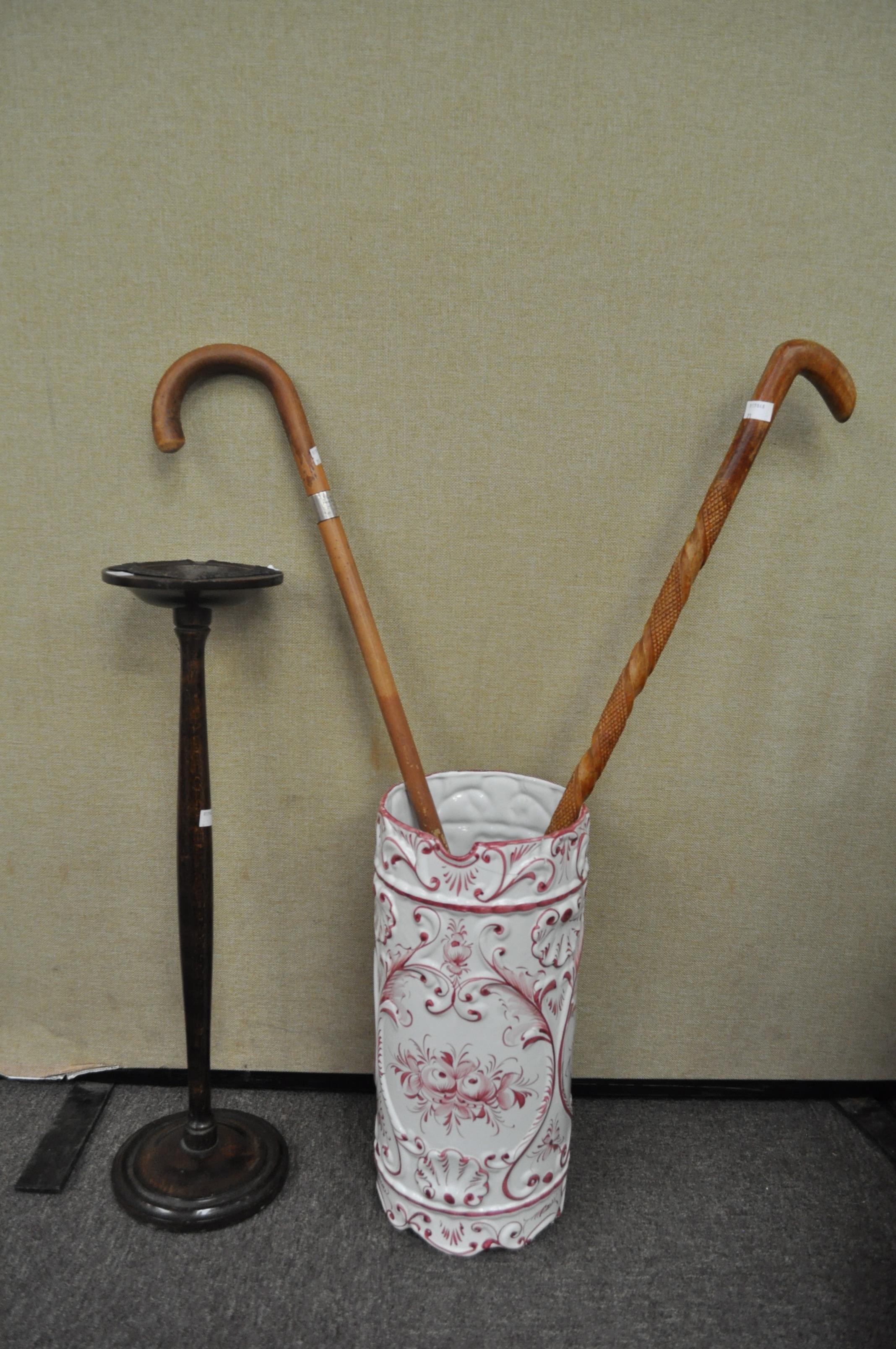 An umbrella stand and walking stick
