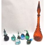 A collection of glass animals and other glass